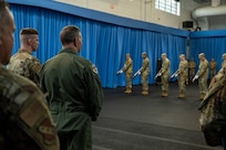 U.S. Air Force Maj. Gen. Stands watching The Honor Guard Drill Team