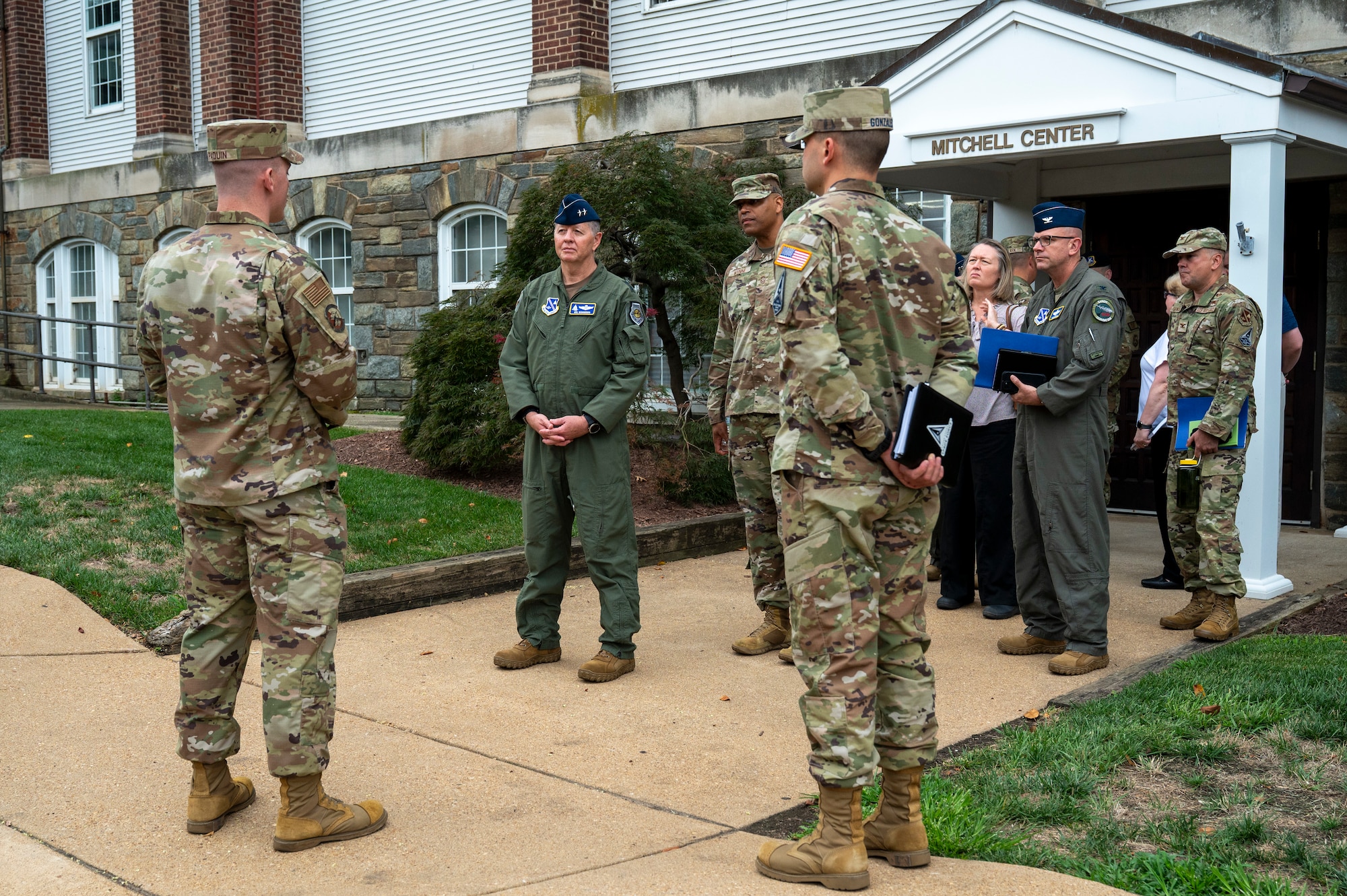 U.S. Air Force Maj. Gen. stands in front of building with JBAB leadership