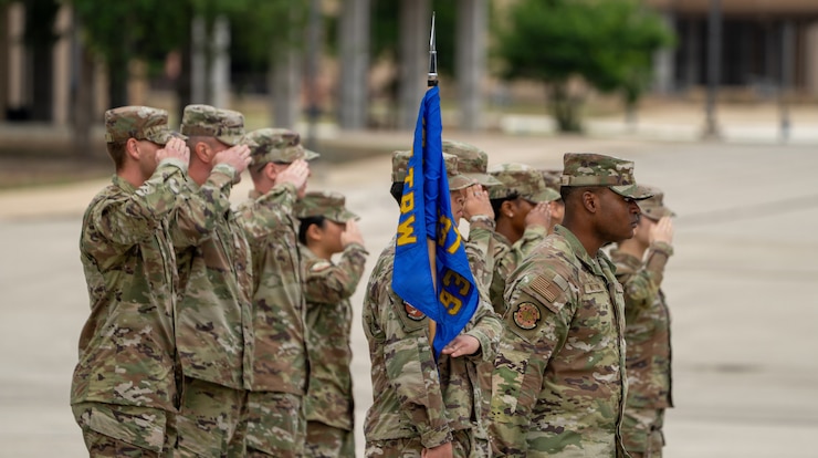 U.S. Air Force Airmen assigned to the 37th Training Wing render a salute while in formation during the Annual Numbered Air Force Drill Down at Joint Base San Antonio-Lackland, Texas, April 11, 2026. The event brings together teams from across the Air Force to demonstrate proficiency in drill and ceremony. (U.S. Air Force photo by Jonathan R. Mallard)