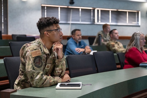 U.S. Air Force Capt. Anfernee Milton, 42d Operations Support squadron airfield operations listen to Jessica Laws, National Weather Service meteorologist during a class at Maxwell Air Force Base Alabama, July 15, 2026.