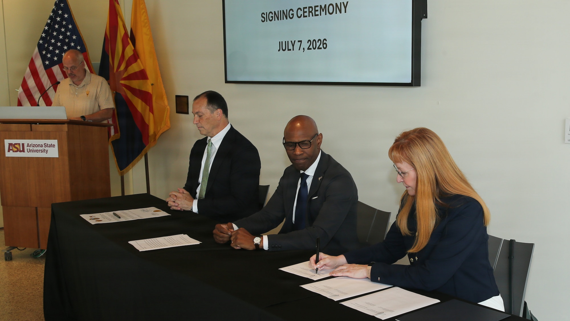 From left, David Dentino, deputy assistant secretary of the Army for installations, housing and partnerships; Chris Howard, Arizona State University executive vice president; and Nancy Balkus, deputy assistant secretary of the Air Force for infrastructure, energy and the environment, signed a 10-year intergovernmental support agreement, July 7, at  the Barrett & O’Connor Center, Washington, D.C., with Arizona State University to help military installations with energy resilience, utility monitoring, and energy planning and preparedness. David Leinberger, chief of Army community partnership, led the event. (Photo courtesy of Arizona State University)
