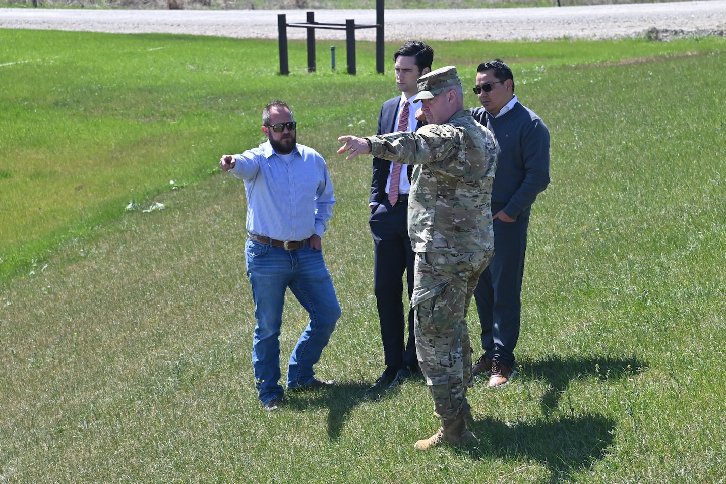 Fort Worth District Commander, Col. Calvin Kroeger, briefs Congressman Brandon Gill on the progress of the Lewisville Spillway Modification Program. Pictured left to right — Tony Mendolia, project manager for the program, Congressman Gill, Col. Kroeger, and Marcos Gaitan, resident engineer for the program. Construction crews have installed more than 70 high-capacity post-tensioned anchors through the spillway weir and into the underlying bedrock. These anchors increase the spillway's resistance to uplift forces and improve overall structural stability. In addition, engineers installed an upstream geomembrane blanket designed to limit seepage beneath the spillway, reducing water pressures that can develop beneath the concrete during flood operations. Additional improvements include reinforcing portions of the spillway apron with 936 rock dowels and restoring disturbed areas once construction is complete.