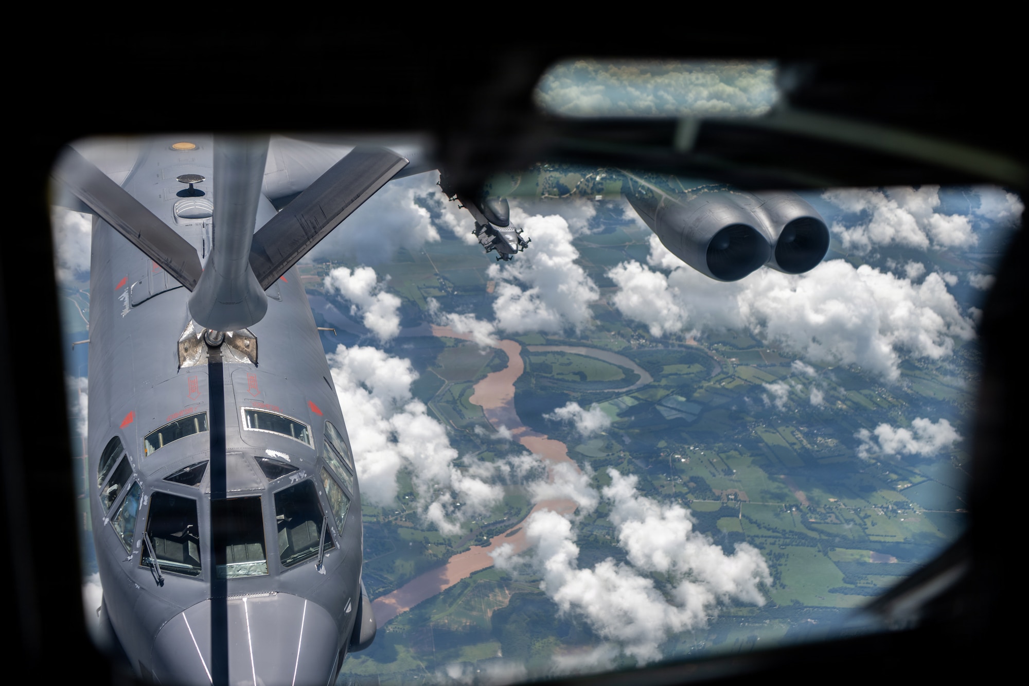 A U.S. Air Force B-52 Stratofortress assigned to the 2nd Bomb Wing is refueled by a KC-135 Stratotanker assigned to the 6th Air Refueling Wing  over the southeastern region of the United States, June 30, 2026. The 6th ARW strengthens interoperability by training with a variety of aircraft and squadrons, ensuring readiness to support global operations anywhere, anytime. (U.S. Air Force photo by Airman 1st Class Helen Ly)