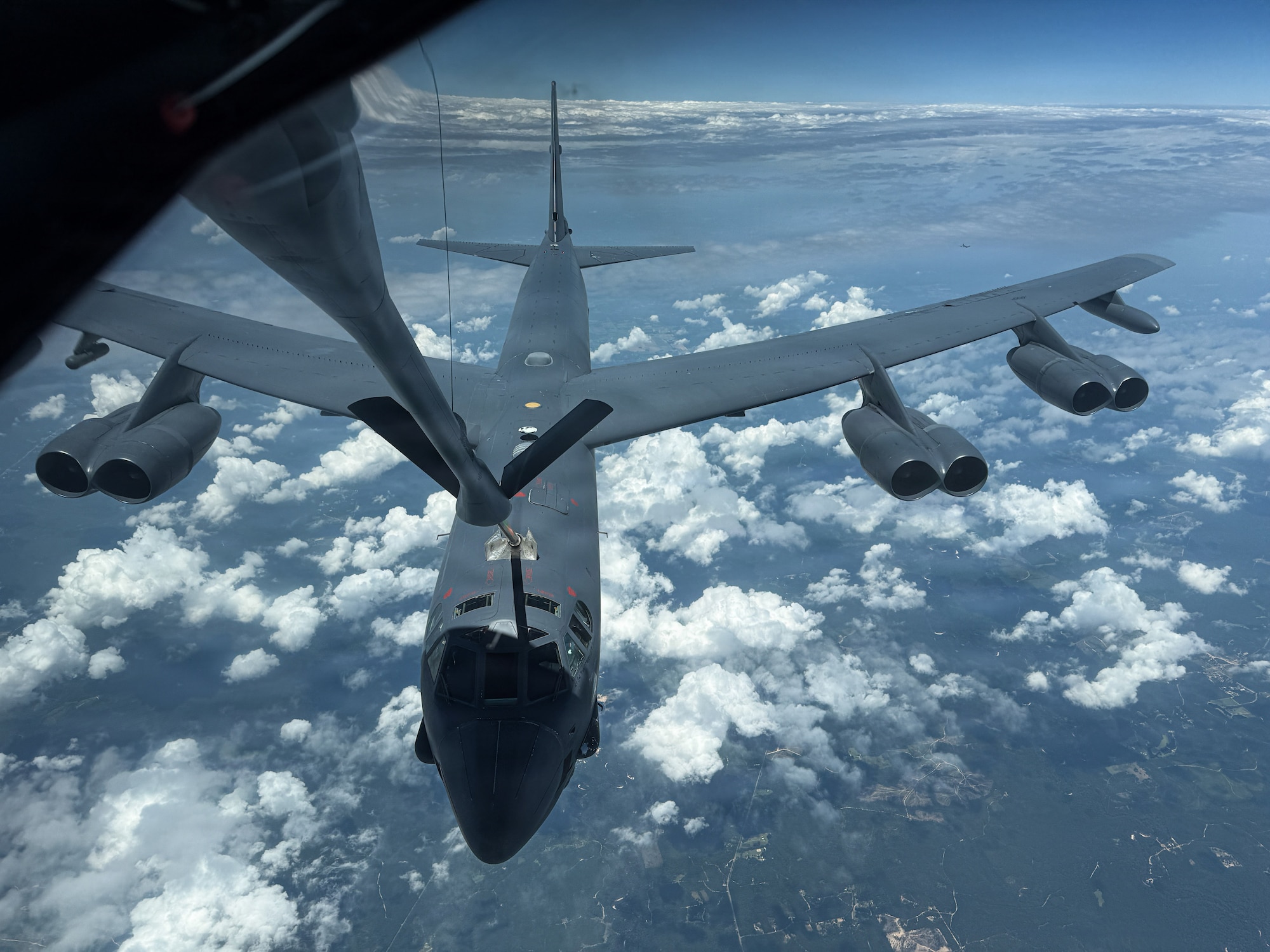 A U.S. Air Force B-52 Stratofortress assigned to the 2nd Bomb Wing is refueled by a KC-135 Stratotanker assigned to the 6th Air Refueling Wing  over the southeastern region of the United States, June 30, 2026. The 6th ARW strengthens interoperability by training with a variety of aircraft and squadrons, ensuring readiness to support global operations anywhere, anytime. (U.S. Air Force photo by Airman 1st Class Helen Ly)