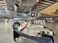 A fragment of a World War II P‑38 Lightning aircraft is displayed at the Experimental Aircraft Association’s AirVenture in Oshkosh, Wisconsin, July 23, 2026.