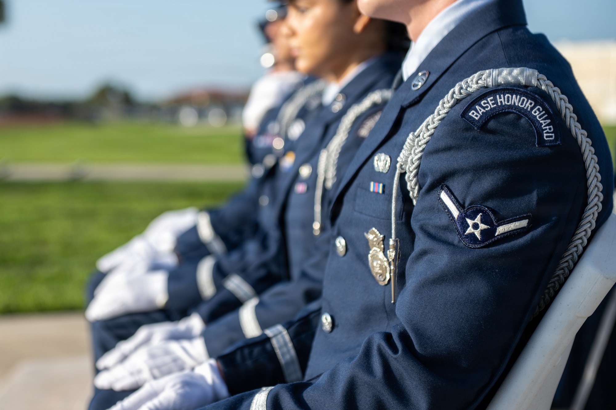 U.S. Air Force ceremonial guardsmen assigned to the 6th Force Support Squadron sit at attention during their induction ceremony at MacDill Air Force Base, Florida, July 22, 2026. The MacDill AFB Honor Guard supports more than 100 ceremonies each year, covering 19 counties and approximately 17,504 square miles within Florida, starting at Lake George in the north and running south to Key West. (U.S. Air Force photo by Senior Airman Derrick Bole)