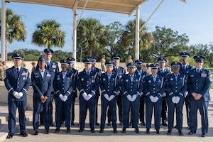 U.S. Air Force ceremonial guardsmen pose for a photo with 6th Air Refueling Wing leadership following a base honor guard induction ceremony at MacDill Air Force Base, Florida, July 22, 2026. The MacDill AFB Honor Guard supports more than 100 ceremonies each year, covering 19 counties and approximately 17,504 square miles within Florida, starting at Lake George in the north and running south to Key West. (U.S. Air Force photo by Senior Airman Derrick Bole)