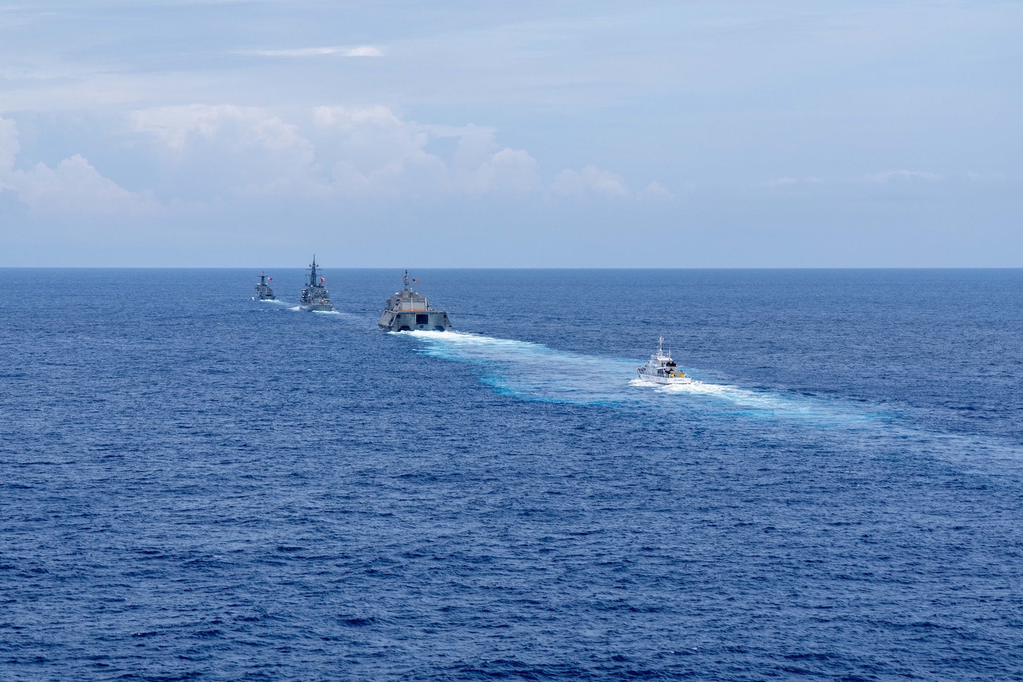 Independence-variant littoral combat ship USS Santa Barbara (LCS 32), second from right, sails in formation with Philippine Coast Guard Parola-class patrol vessel BRP Malabrigo (MRRV 4402), right, Japan Maritime Self-Defense Forces Murasame-class destroyer JS Yudachi (DD 103), second from left, and Jose Rizal-class guided-missile frigate BRP Antonio Luna (FFG 15), left, during the Multilateral Maritime Cooperative Activity (MCA) in the Philippines’ Exclusive Economic Zone, July 24, 2026. The U.S Navy routinely operates with the Armed Forces of the Philippines and partners and allies through MCAs to continually develop, exercise and enhance multi-domain tactical interoperability to uphold peace and security in the region. USS Santa Barbara is on a rotational deployment to the 7th Fleet area of operations in support of a free and open Indo-Pacific. (U.S. Navy photo by Mass Communication Specialist 2nd Class Caylen McCutcheon)