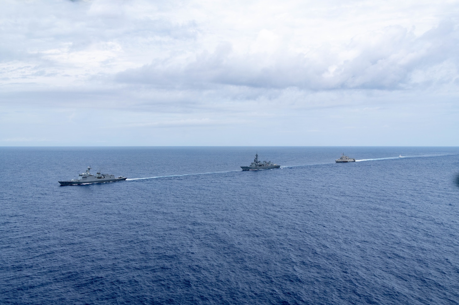 Independence-variant littoral combat ship USS Santa Barbara (LCS 32), second from right, sails in formation with Philippine Coast Guard Parola-class patrol vessel BRP Malabrigo (MRRV 4402), right, Japan Maritime Self-Defense Forces Murasame-class destroyer JS Yudachi (DD 103), second from left, and Jose Rizal-class guided-missile frigate BRP Antonio Luna (FFG 15), right, during the Multilateral Maritime Cooperative Activity (MCA) in the Philippines’ Exclusive Economic Zone, July 24, 2026. The U.S Navy routinely operates with the Armed Forces of the Philippines and partners and allies through MCAs to continually develop, exercise and enhance multi-domain tactical interoperability to uphold peace and security in the region. USS Santa Barbara is on a rotational deployment to the 7th Fleet area of operations in support of a free and open Indo-Pacific. (U.S. Navy photo by Mass Communication Specialist 2nd Class Caylen McCutcheon)