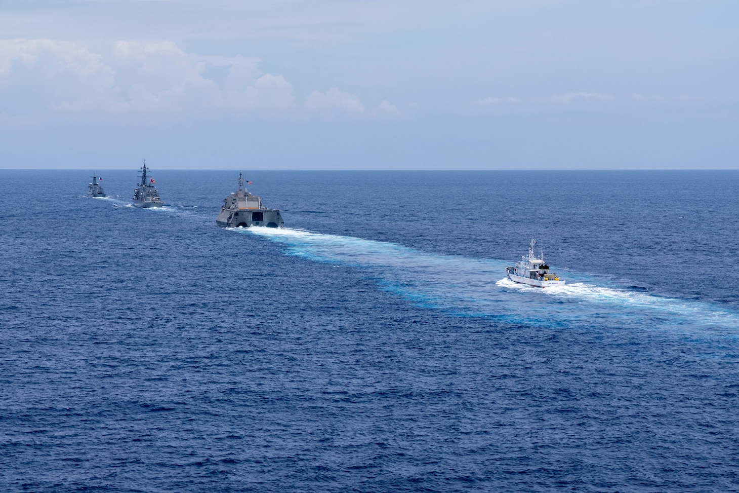 Independence-variant littoral combat ship USS Santa Barbara (LCS 32), second from right, sails in formation with Philippine Coast Guard Parola-class patrol vessel BRP Malabrigo (MRRV 4402), right, Japan Maritime Self-Defense Forces Murasame-class destroyer JS Yudachi (DD 103), second from left, and Jose Rizal-class guided-missile frigate BRP Antonio Luna (FFG 15), left, during the Multilateral Maritime Cooperative Activity (MCA) in the Philippines’ Exclusive Economic Zone, July 24, 2026. The U.S Navy routinely operates with the Armed Forces of the Philippines and partners and allies through MCAs to continually develop, exercise and enhance multi-domain tactical interoperability to uphold peace and security in the region. USS Santa Barbara is on a rotational deployment to the 7th Fleet area of operations in support of a free and open Indo-Pacific. (U.S. Navy photo by Mass Communication Specialist 2nd Class Caylen McCutcheon)