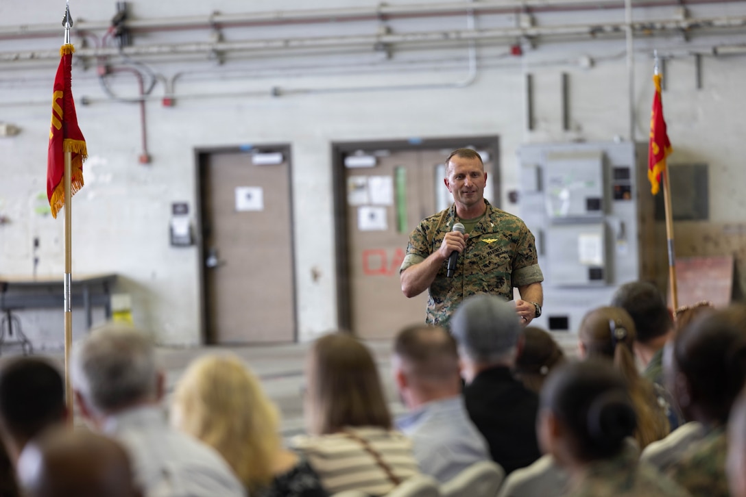 U.S. Marine Corps Col. Arthur Bruggeman, from Florida, the commanding officer of Marine Aircraft Group 14, 2nd Marine Aircraft Wing, addresses the audience during a change of command ceremony at Marine Corps Air Station Cherry Point, North Carolina, July 23, 2026. The ceremony signified the transfer of authority, accountability and leadership from Col. Benjamin Grant, from Ohio, outgoing commanding officer of MAG-14, to Bruggeman. (U.S. Marine Corps photo by Cpl. Mya Seymour)