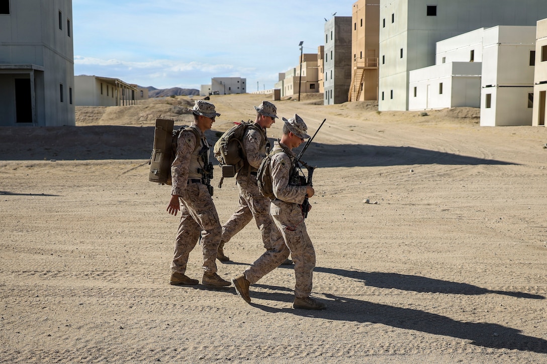 U.S. Marines with II Marine Expeditionary Force Information Group patrol during Multi Domain Reconnaissance Course at Range 220 as part of Service Level Training Exercise 4-26 on Marine Corps Air Ground Combat Center, Twentynine Palms, California, July 24, 2026. MDRC provides reconnaissance and surveillance for units to support the ground combat element and aviation combat element. SLTE 4-26 is designed to be a challenging, realistic training environment that produces combat-ready forces capable of operating as an integrated Marine Air Ground Task Force across all domains of military operations. (U.S. Marine Corps photo by Staff Sgt. Matthew Kirk)