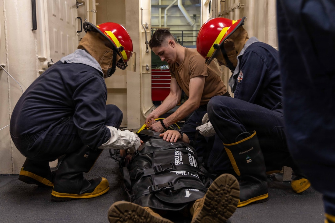 U.S. Sailors with San Antonio-class amphibious transport dock USS Fort Lauderdale (LPD 28), prepare to transport a U.S. Marine with 3rd Battalion, 2nd Marine Regiment, Littoral Combat Force-24, on a litter during general quarters training while underway in the Caribbean Sea, June 12, 2026. U.S. military forces are deployed to the U.S. Southern Command area of responsibility in support of Operation SOUTHERN SPEAR, Department of War-directed operations, and the president’s priorities to disrupt illicit drug trafficking, deter malign actors and protect the homeland through continuous presence. (U.S. Marine Corps photo)
