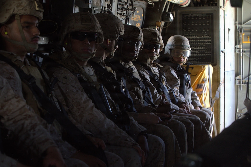 U.S. Marines on an MV-22B Osprey, a tiltrotor aircraft with Marine Medium Tiltrotor Squadron (VMM) 764, Marine Aircraft Group 41, 4th Marine Aircraft Wing, prepare for takeoff during Integrated Training Exercise 3-26, Marine Corps Air-Ground Combat Center Twentynine Palms, California, June 12, 2026. ITX is designed to generate combat readiness and ensure the Reserve Component provides critical strategic depth to the Total Force. From complex combined arms maneuvers to all-domain integration, these Marines are proving that they are ready to augment, reinforce and fight alongside the active component at a moment's notice. (U.S. Marine Corps photo by Cpl. Donnell Brown)