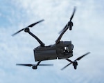 A Black Widow drone manned by an Indiana National Guard Soldier, assigned to 1st Battalion, 293rd Infantry Regiment, flies in the air during a Combat Readiness Exercise at Muscatatuck Training Center, near Butlerville, Indiana, July 24, 2026. The exercise validates the Indiana National Guard’s ability to rapidly deploy, integrate with joint and international partners, and fight in complex, large-scale combat operations.