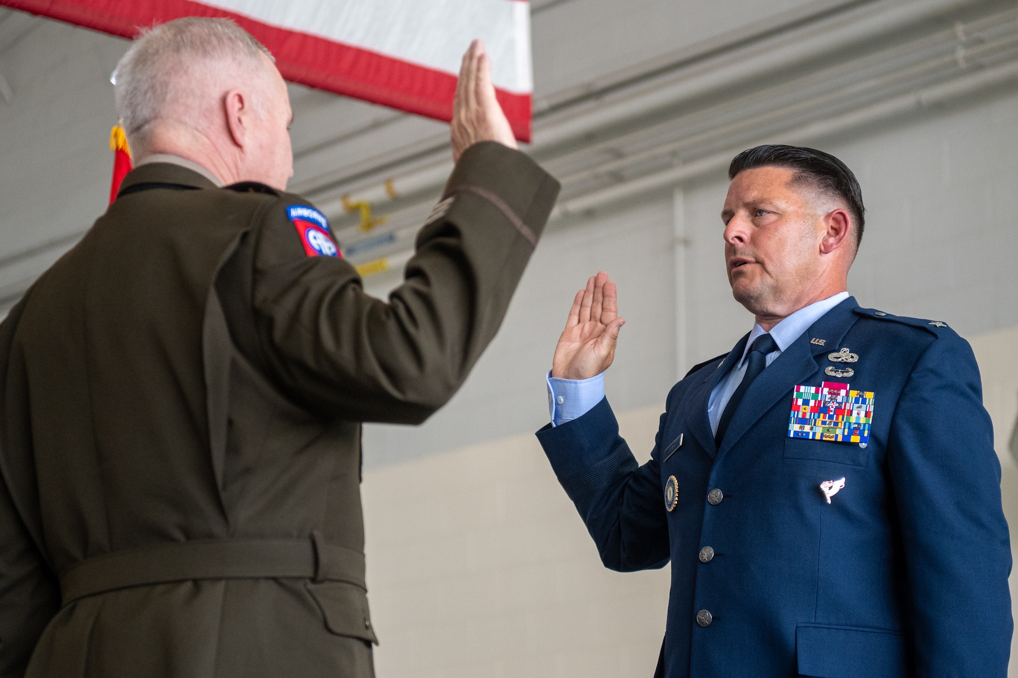 U.S. Army Maj. Gen. Haldane Lambereton, left, adjutant general of the Kentucky National Guard, administers the oath of office to U.S. Air Force Brig. Gen. Ash Groves, chief of the Air staff at Joint Force Headquarters-Kentucky, during Groves’ promotion ceremony at the Kentucky Air National Guard Base in Louisville, Ky., June 7, 2026. Groves previously served as director of the Air staff at JFHQ-KY. (U.S. Air National Guard photo by Senior Airman Annaliese Billings)