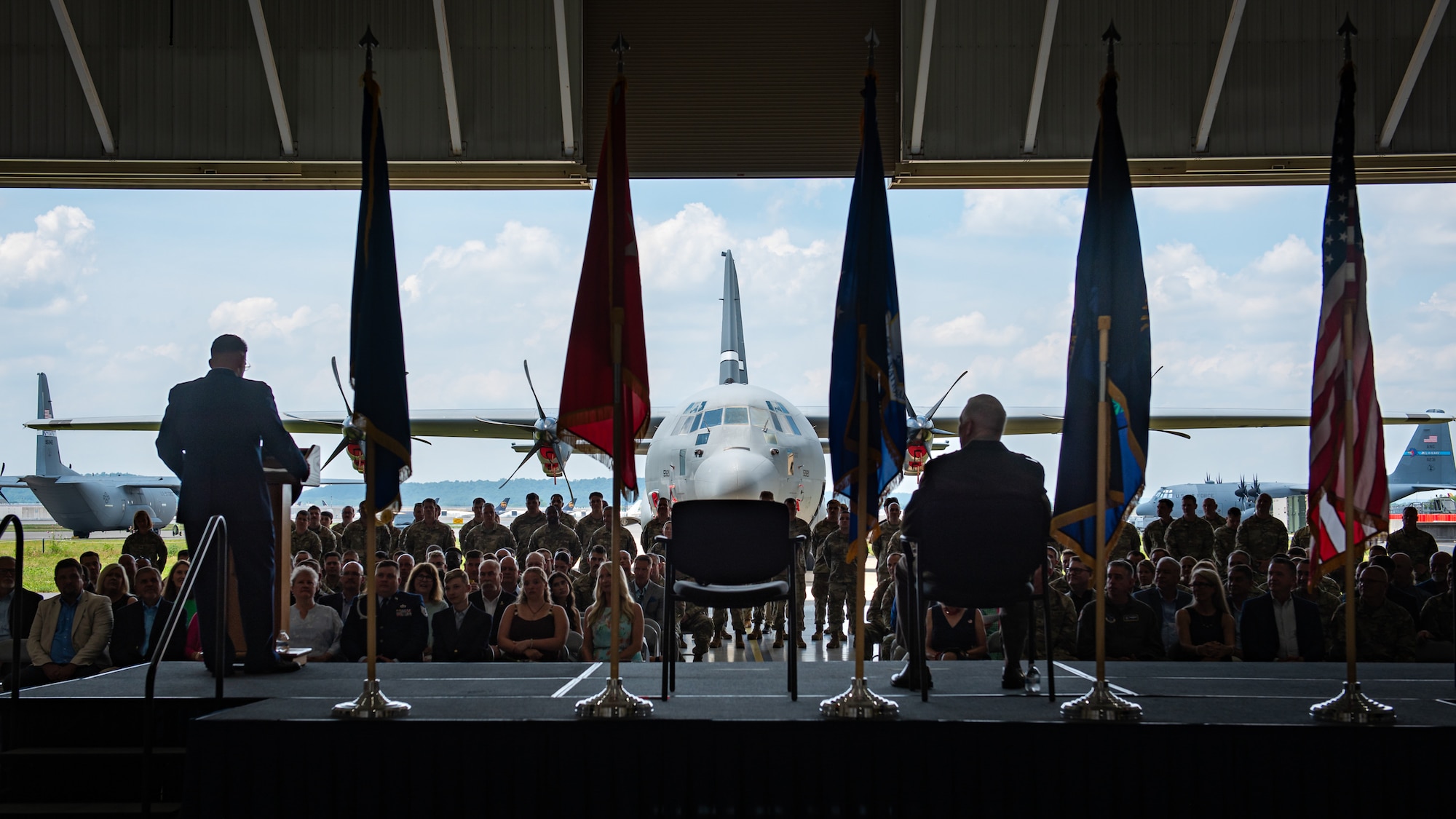 Friends, family and fellow service members attend a ceremony promoting Col. Ash Groves to the rank of brigadier general at the Kentucky Air National Guard Base in Louisville, Ky., June 7, 2026. Groves, who previously served as director of the Air staff at Joint Force Headquarters-Kentucky, is now chief of the Air staff at JFHQ-KY. (U.S. Air National Guard photo by Tech. Sgt. Chloe Ochs)