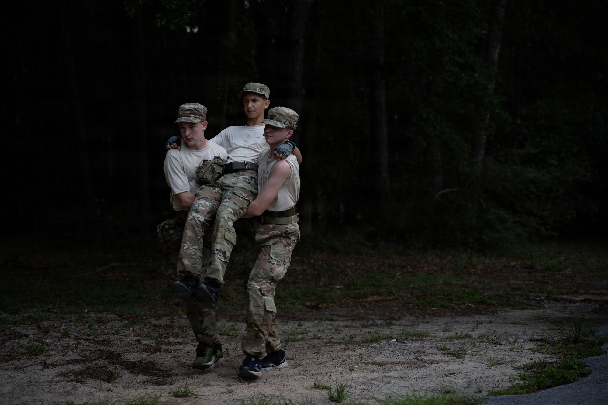 Junior ROTC cadets conduct a carrying technique for the Monster Mash team fitness event during Summer Leadership School at Hurlburt Field, Florida, June 26, 2026.
