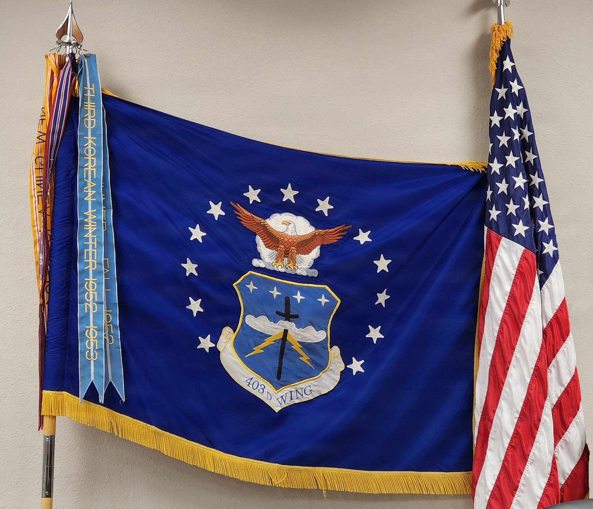 A U.S. Air Force flag hangs on the wall
