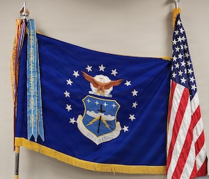 A U.S. Air Force flag hangs on the wall