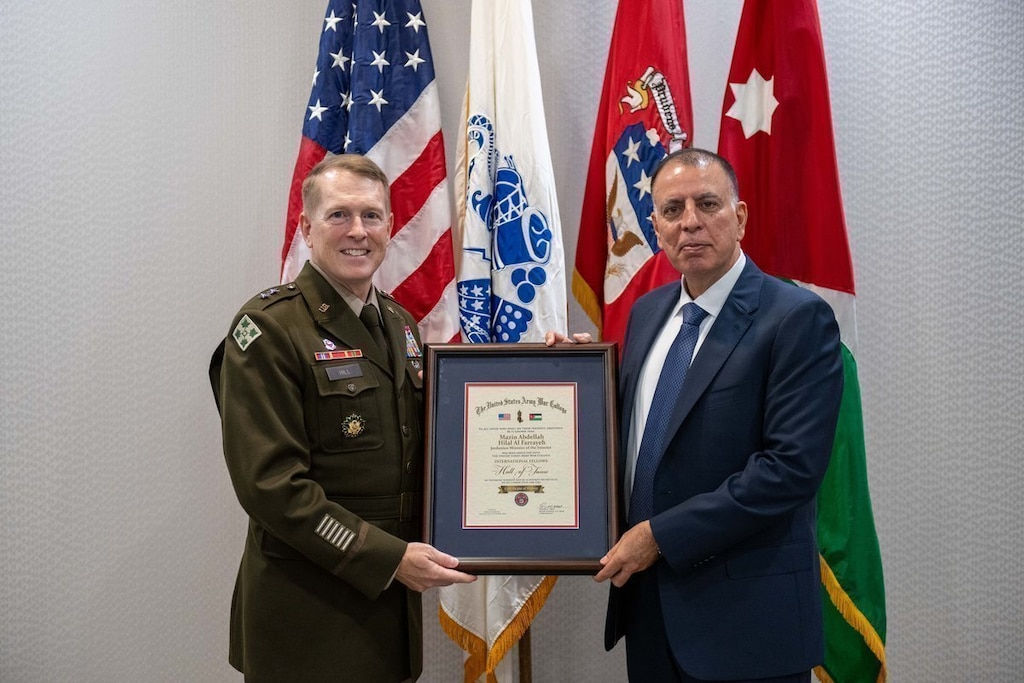 Jordanian Minister of the Interior Mazin Al Farrayeh is presented with a certificate during his induction into the U.S. Army War College International Fellow Hall of Fame.
