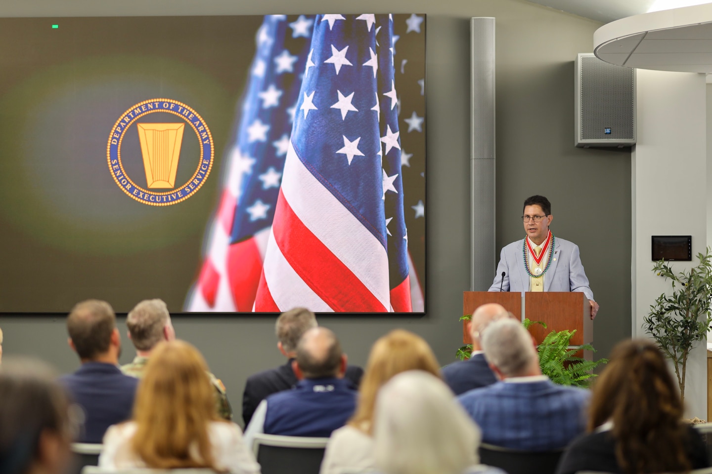 ERDC Environmental Laboratory Director Dr. Edmond Russo (middle) speaks during his retirement ceremony