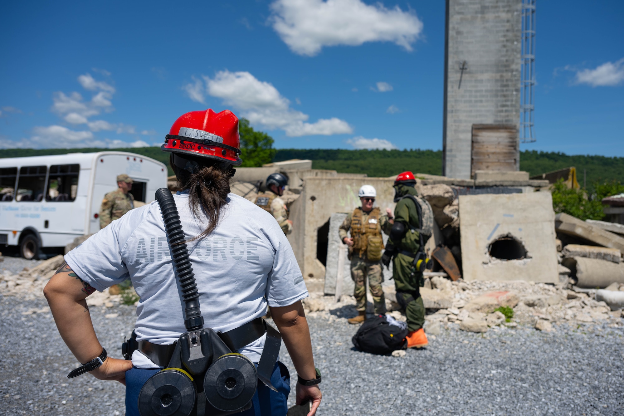 105th Medics train in rubble city.