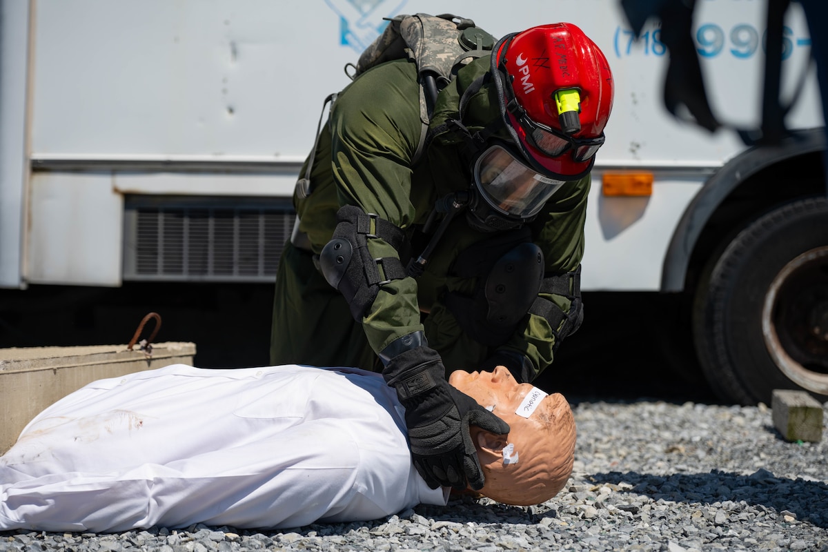 105th Medics train in rubble city.