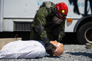105th Medics train in rubble city.