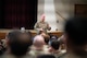 U.S. Air Force Chief Master Sergeant Scott D. Bradbury, 5th Bomb Wing Command Chief, addresses Airmen at an all-call July 23, 2026, at Minot Air Force Base, North Dakota. All-calls, or Commanders' calls, are held to bring members of the unit together to communicate priorities, recognize outstanding performance and provide a forum for Airmen to ask questions directly to leadership.