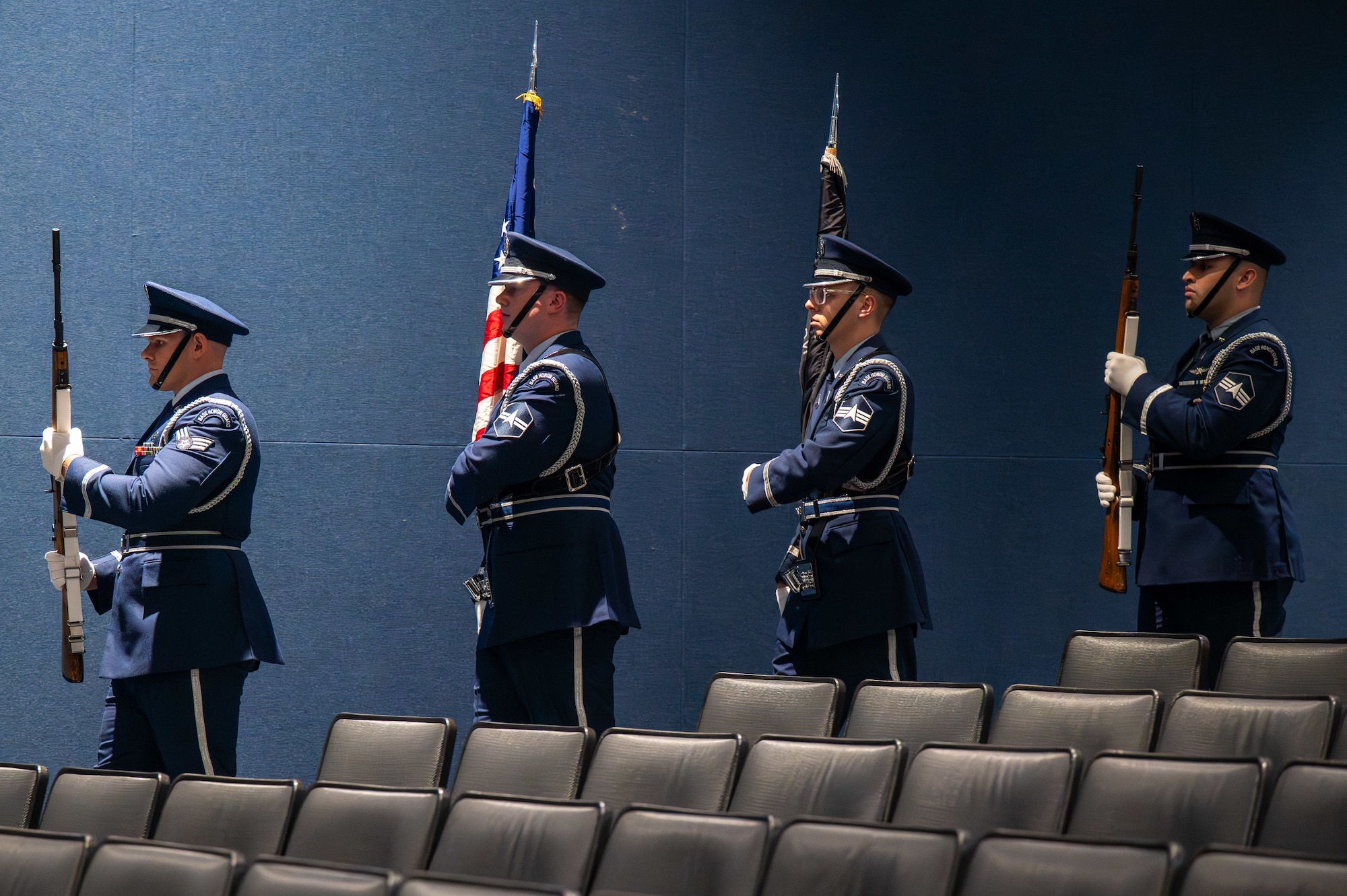 Military members conduct a change of responsibility ceremony