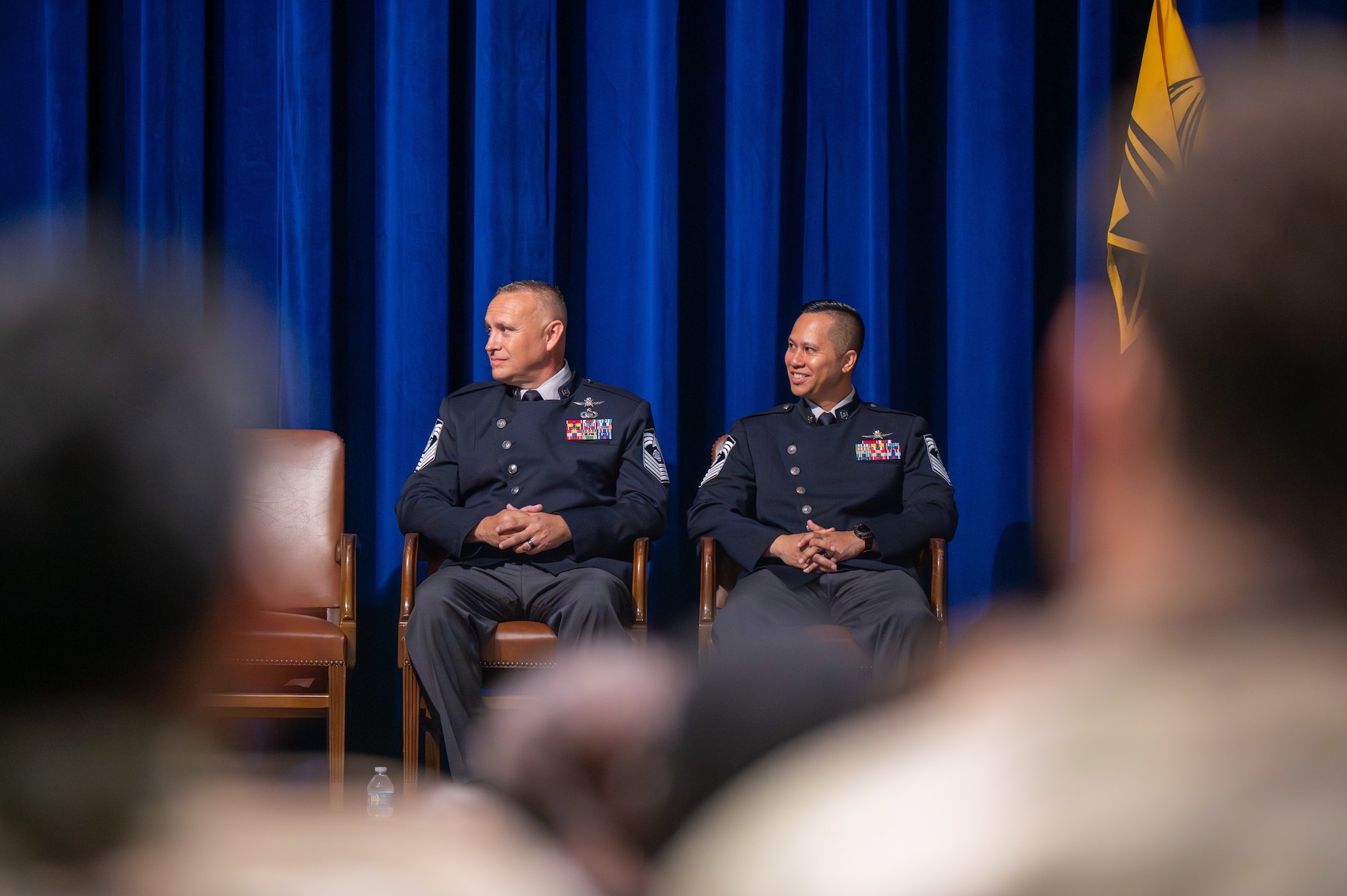 Military members conduct a change of responsibility ceremony