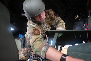 A U.S. Air Force Airman assigned to the 355th Combat Air Base Squadron participates in vehicle search training during Exercise Coyote Storm 26.1 at Tyndall Air Force Base, Florida, July 20, 2026. The exercise provided Airmen hands-on experience responding to high-intensity scenarios in deployed environments. (U.S. Air Force photo by Airman 1st Class Jaden Kidd)
