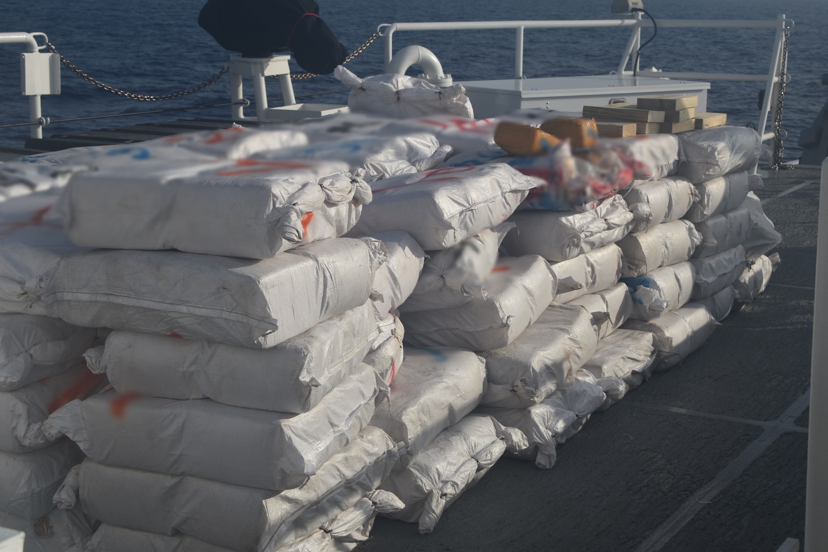 Seized marijuana bales sit on the deck of Coast Guard Cutter Charles Sexton, July 25, 2026, approximately 80 miles southwest of Great Inagua, Bahamas. Coast Guard Cutter Charles Sexton interdicted a suspected drug-smuggling vessel in coordination with the Royal Bahamian Defense Force crews and seized approximately 2,380 pounds of presumptive marijuana worth an estimate of $2.8 million. (U.S. Coast Guard photo by Coast Guard Cutter Charles Sexton's crew)