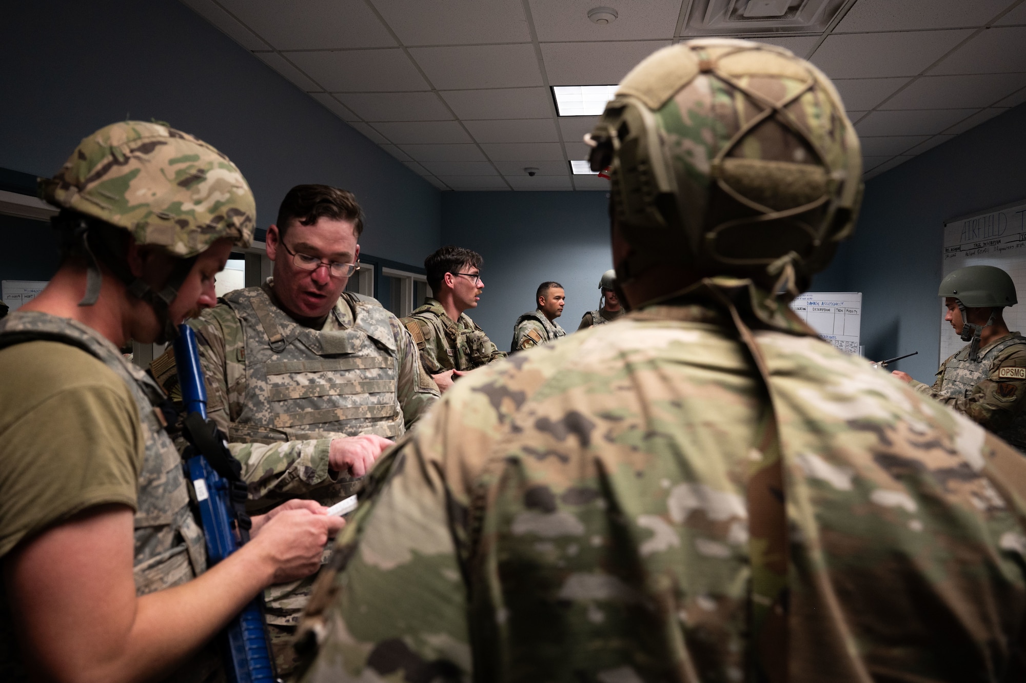 U.S. Air Force Airmen assigned to the 355th Combat Air Base Squadron manage the Emergency Operations Center during Exercise Coyote Storm 26.1 at Tyndall Air Force Base, Florida, July 22, 2026. CS 26.1 strengthened unit cohesion by integrating Airmen from multiple units into cross-functional teams prepared to meet mission requirements. (U.S. Air Force photo by Airman 1st Class Jaden Kidd)