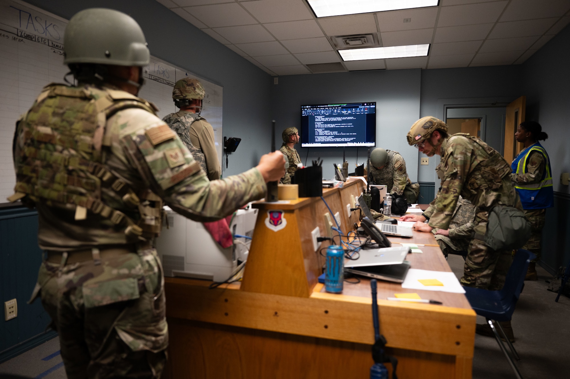 U.S. Air Force Airmen assigned to the 355th Combat Air Base Squadron manage the Emergency Operations Center during Exercise Coyote Storm 26.1 at Tyndall Air Force Base, Florida, July 22, 2026. Airmen were equipped with the skills needed to maintain strategic deterrence in austere and unpredictable environments. (U.S. Air Force photo by Airman 1st Class Jaden Kidd)