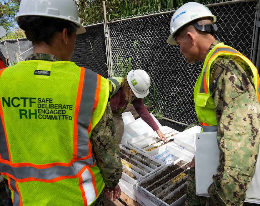 embers of Navy Closure Task Force-Red Hill (NCTF-RH) inspect drilling cores from a drill rig during the installation of a groundwater monitoring well near the Red Hill Bulk Fuel Storage Facility (RHBFSF) in Honolulu, July 8, 2026. Charged with the safe decommissioning of the RHBFSF, NCTF-RH was established by the Department of the Navy as a commitment to the community and the environment. NCTF-RH continues to engage with the people of Hawaii, regulatory agencies, and other stakeholders as it safely and deliberately decommissions the RHBFSF. (U.S. Navy photo by Mass Communication Specialist 1st Class Glenn Slaughter)