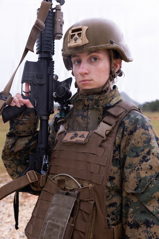 U.S. Marine Corps Lance Cpl. Kylee Disanto, a combat videographer with 3rd Marine Division, poses for a photo during a Communication Strategy and Operations field training exercise on Camp Hansen, Okinawa, Japan, April 7, 2026. The COMMSTRAT FTX is a five-day event focused on increasing quick decision-making skills and tactical proficiency through high pressure environments to provide commanders with more capable COMMSTRAT forces. (U.S. Marine Corps photo by Cpl. Ella Cadby)