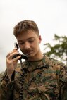 U.S. Marine Corps Pfc. Ryan Wicinski, a data systems administrator with Marine Rotational Force – Southeast Asia, I Marine Expeditionary Force, operates a radio while conducting a high frequency radio shot to Marine Rotational Force – Darwin, I MEF, on Camp General Emilio Aguinaldo, Philippines, July 23, 2026.