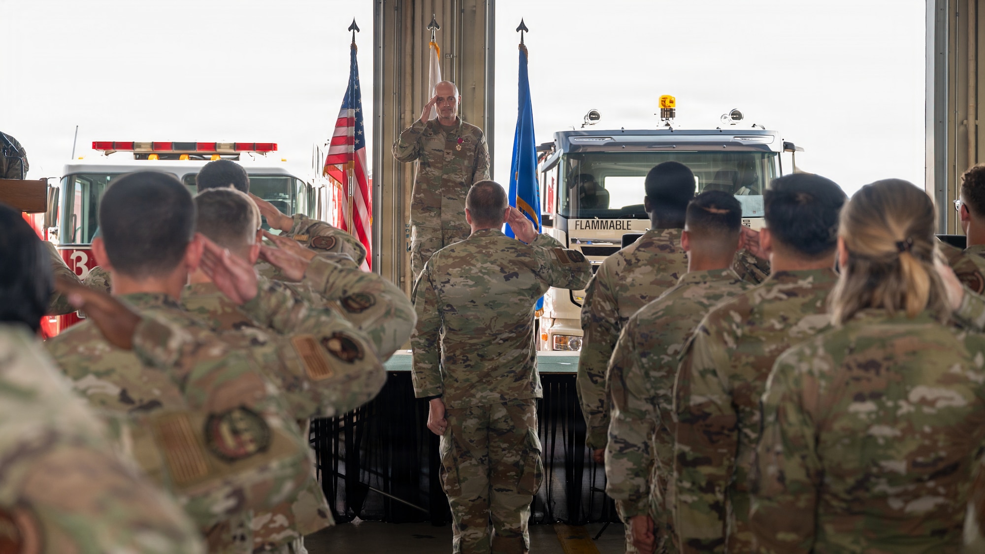 Flight salutes their outgoing commander