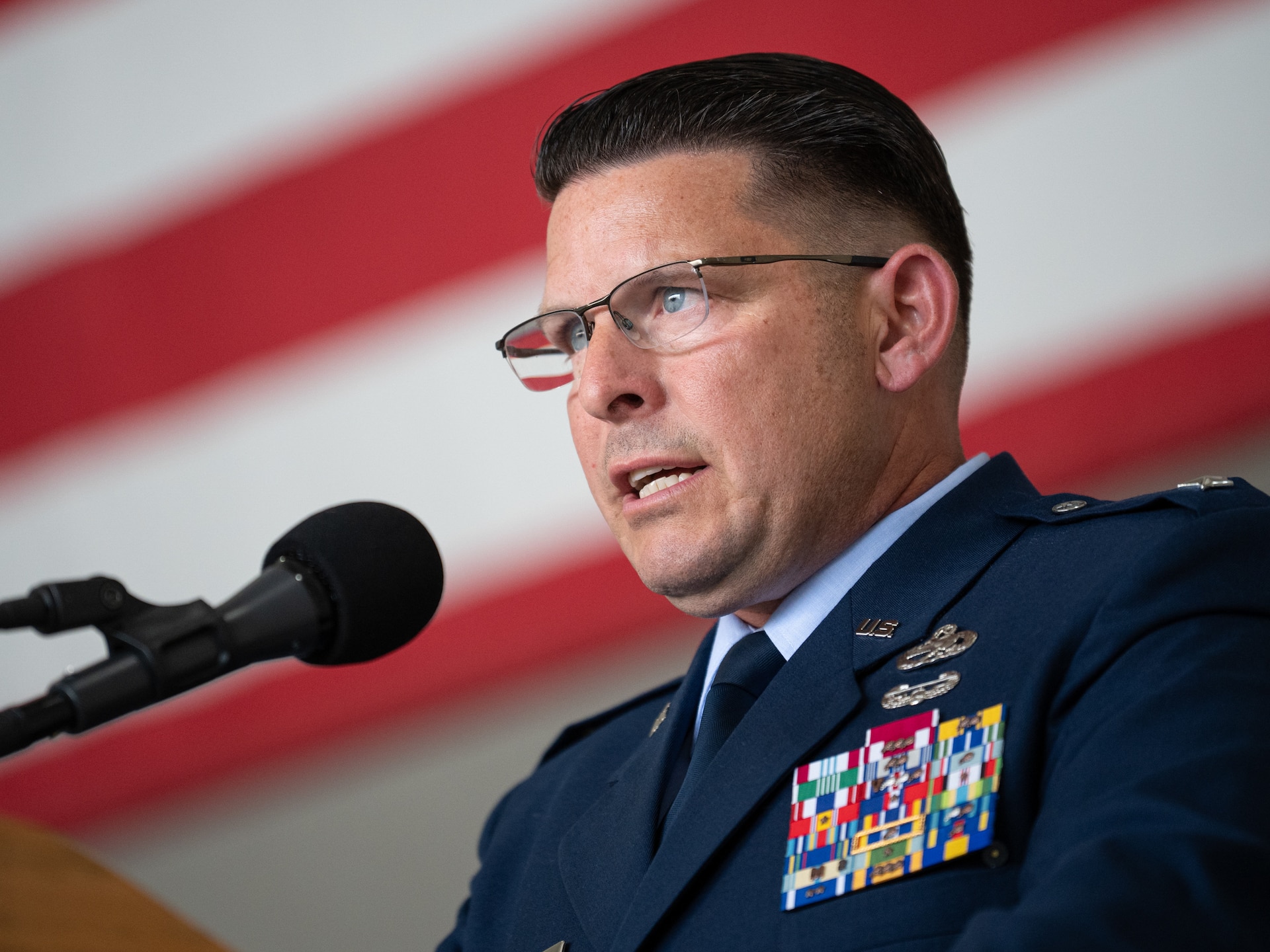 Newly promoted Brig. Gen. Ash Groves speaks to an audience of fellow Airmen, family and friends during his promotion ceremony at the Kentucky Air National Guard Base in Louisville, Ky., June 7, 2026. Groves, who previously served as director of the Air staff at Joint Force Headquarters-Kentucky, is now chief of the Air staff at JFHQ-KY. (U.S. Air National Guard photo by Senior Airman Annaliese Billings)