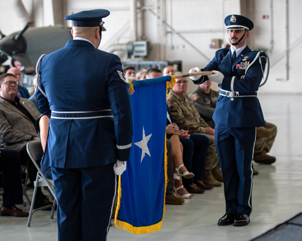 Members of the 123rd Airlift Wing Honor Guard unfurl a general officer’s flag during a ceremony at the Kentucky Air National Guard Base in Louisville, Ky., to promote Col. Ash Groves to the rank of brigadier general on June 7, 2026. Groves is chief of the Air staff at Joint Force Headquarters-Kentucky. (U.S. Air National Guard photo by Tech. Sgt. Chloe Ochs)