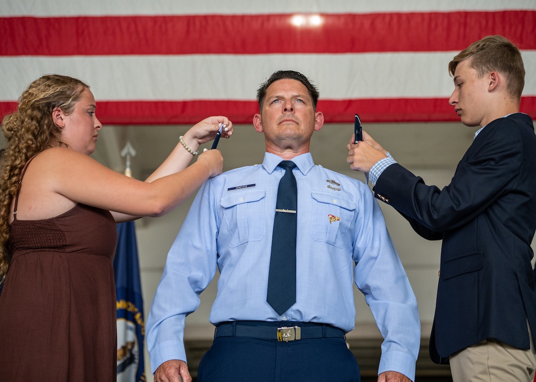 Col. Ash Groves, center, chief of the Air staff at Joint Force Headquarters-Kentucky, is pinned with the rank of brigadier general by family members during a promotion ceremony at the Kentucky Air National Guard Base in Louisville, Ky., June 7, 2026. Groves previously served as headquarters’ director of Air staff. (U.S. Air National Guard photo by Senior Airman Annaliese Billings)