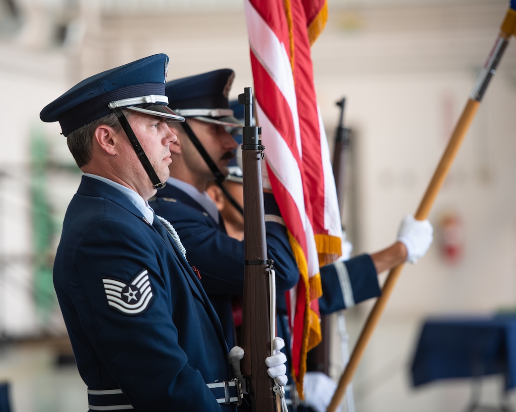 Members of the 123rd Airlift Wing Honor Guard present the colors during a ceremony promoting Col. Ash Groves to the rank of brigadier general at the Kentucky Air National Guard Base in Louisville, Ky., June 7, 2026. Groves is chief of the Air staff at Joint Force Headquarters-Kentucky. (U.S. Air National Guard photo by Tech. Sgt. Chloe Ochs)