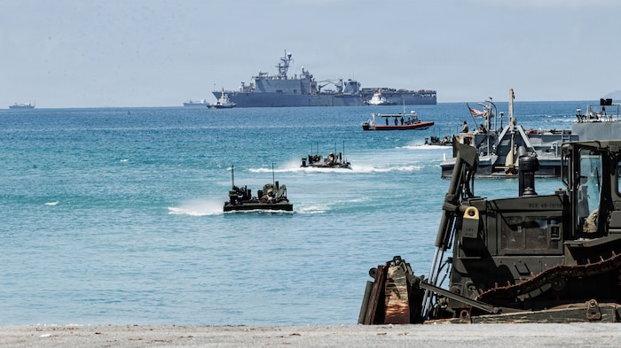 Amphibious Combat Vehicles with the 31st Marine Expeditionary Unit, III Marine Expeditionary Force, from Whidbey Island-class dock landing ship USS Rushmore (LSD 47), arrive at White Beach Naval Facility, Okinawa, Japan, July 23, 2026.