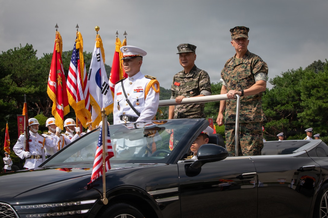 Commanding General of III Marine Expeditionary Force, U.S. Marine Corps Lt. Gen. Benjamin Watson, right, and Republic of Korea Marine Corps Lt. Gen. Ju Il-Seok, 37th commandant of the Republic of Korea Marine Corps, ride in a parade car during a tour of ROK Marine Corps headquarters in Hwaseong, South Korea, July 24, 2026.