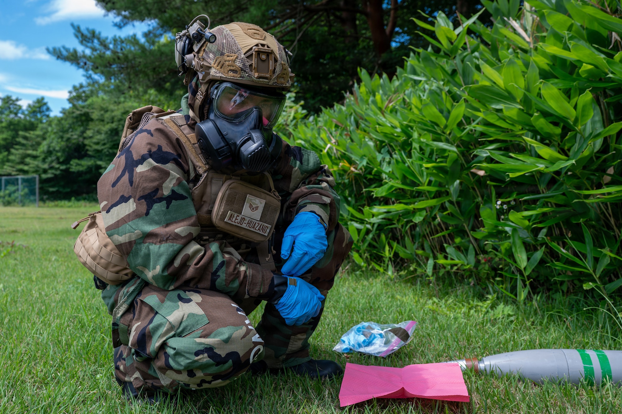 U.S. Air National Guard Staff Sgt. Michelle Alejo-Huazano, 163rd Civil Engineer Squadron emergency management specialist, California Air National Guard, conducts simulated chemical, biological, radiological and nuclear sample collection during Serow Samurai at Misawa Air Base, Japan, July 20, 2026.