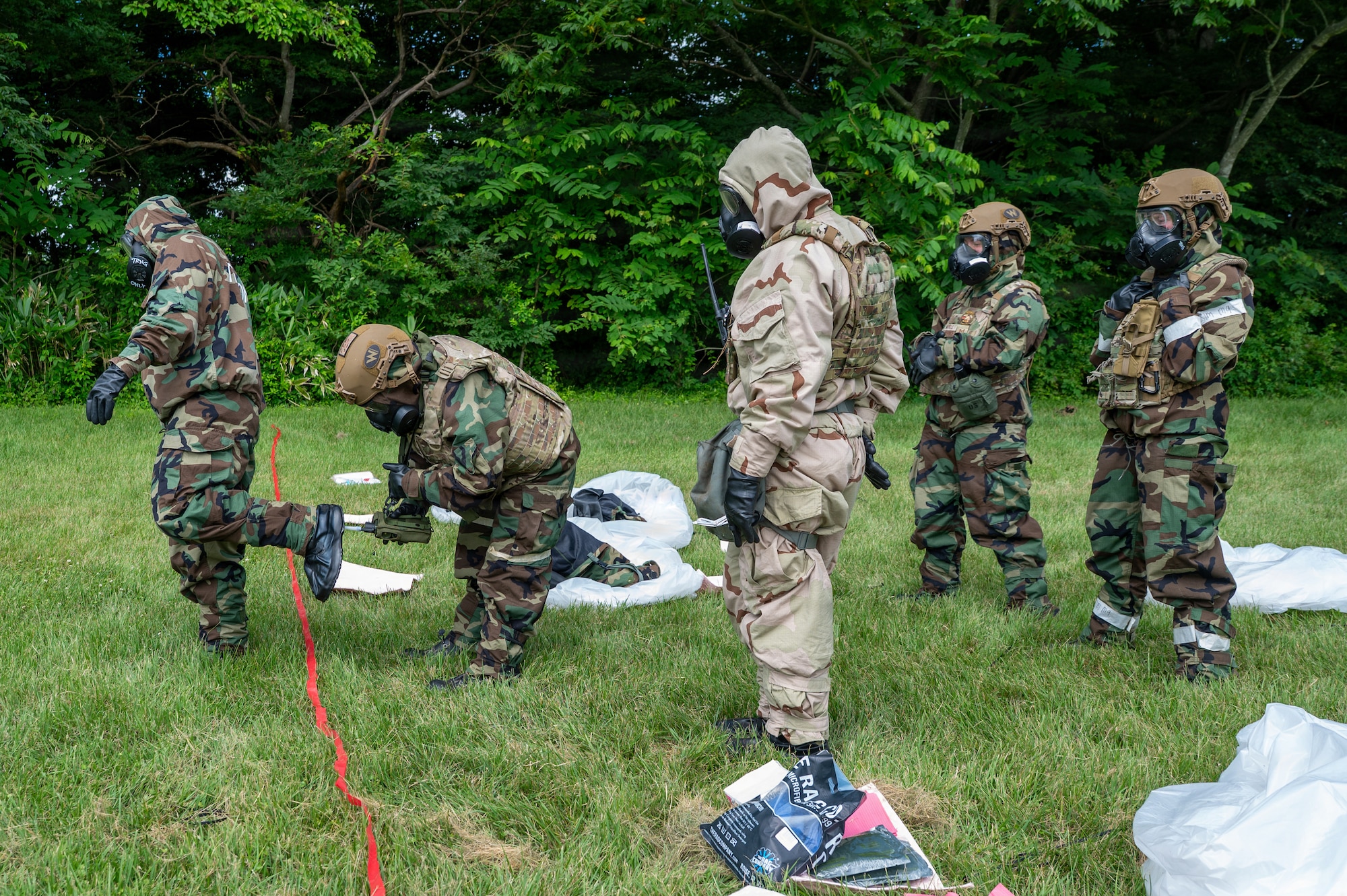 U.S. Air National Guard members conduct contamination control procedures using a Joint Chemical Agent Detector during a chemical, biological, radiological and nuclear training scenario as part of Serow Samurai at Misawa Air Base, Japan, July 20, 2026.