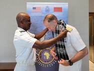 Commander, U.S. Naval Forces Europe and Africa Admiral George Wikoff took part in a cultural gift exchange with the Commander of the Cabo Verde Coast Guard, Capitao de Navio Kahbi Yassine Fonseca Pereira Batista during the African Maritime Forces Summit 2026.