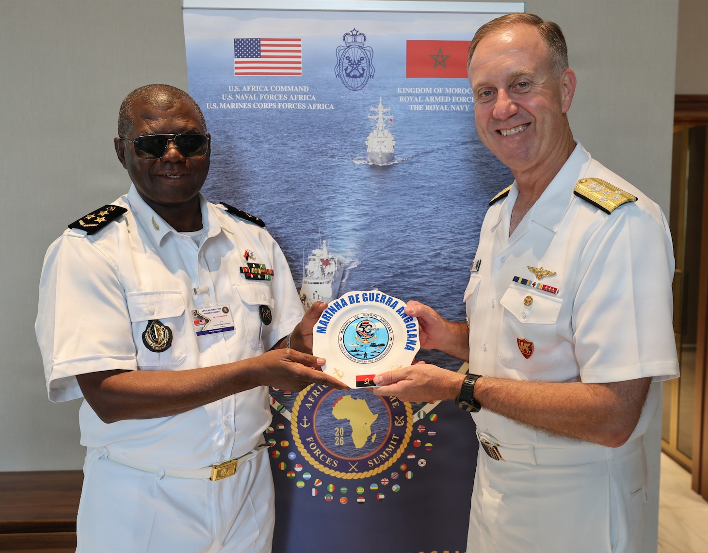 Adm. George Wikoff, Commander, U.S. Naval Forces Europe and Africa, exchanges gifts with Adm. Valentim Alberto Antonio, Commander of the Angolan Navy, in Rabat, Morocco, July 21, 2026